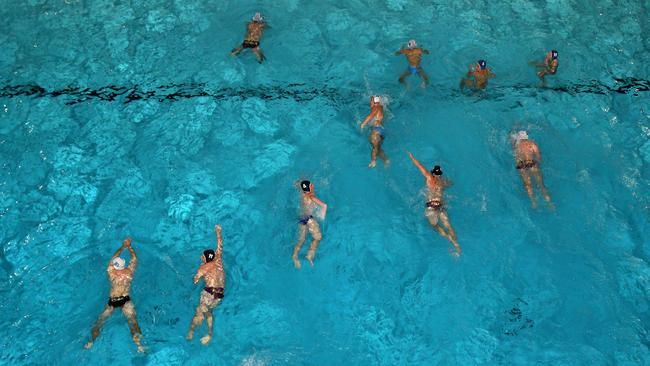 Swimmers take their last dip at Parramatta Memorial Pool.