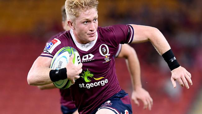 BRISBANE, AUSTRALIA - FEBRUARY 22: Isaac Lucas of the Reds breaks away from the defence during the round four Super Rugby match between the Reds and the Sunwolves at Suncorp Stadium on February 22, 2020 in Brisbane, Australia. (Photo by Bradley Kanaris/Getty Images)