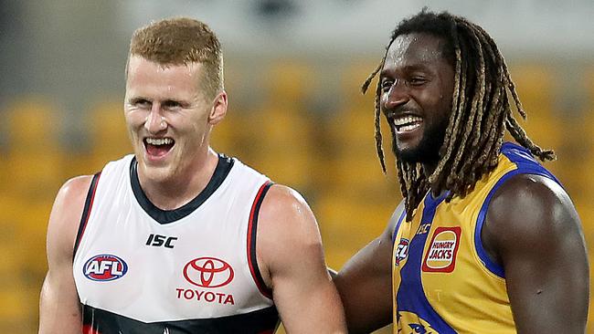 The pair had a good laugh about the whole incident after the siren. Picture: Jono Searle/AFL Photos/via Getty Images