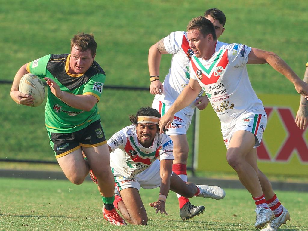 Palmerston’s Blake Blomley on the run in the NRL NT A-Grade match between Nightcliff Dragons and Palmerston Raiders. Picture: Glenn Campbell