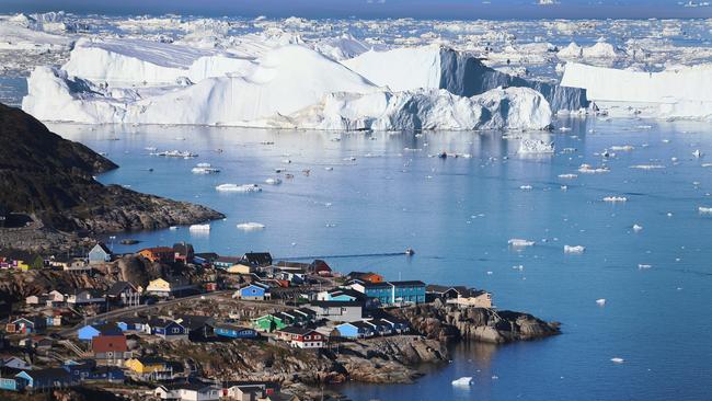 The village of Ilulissat in Greenland near icebergs that broke off from the Jakobshavn Glacier in 2013. Picture: Getty