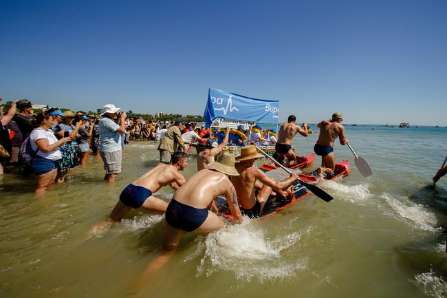 They’re off and paddling at the 2019 Beer Can Regatta at Mindel Beach. Pic Glenn Campbell