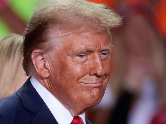 Former US President and Republican presidential candidate Donald Trump looks on during his last campaign rally at Van Andel Arena in Grand Rapids, Michigan on November 5, 2024. (Photo by JEFF KOWALSKY / AFP)