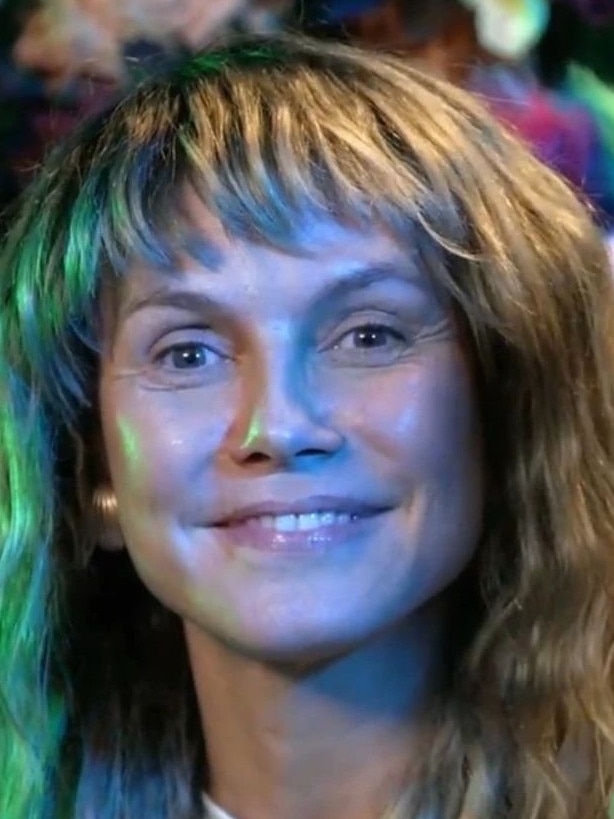 A fresh-faced Heidi Klum waiting to undergo her transformation.