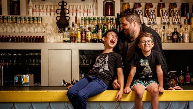 Chef Duncan Welgemoed with his sons Max, nine, and Alex, six, in his restaurant Africola in Adelaide. Picture: Matt Turner