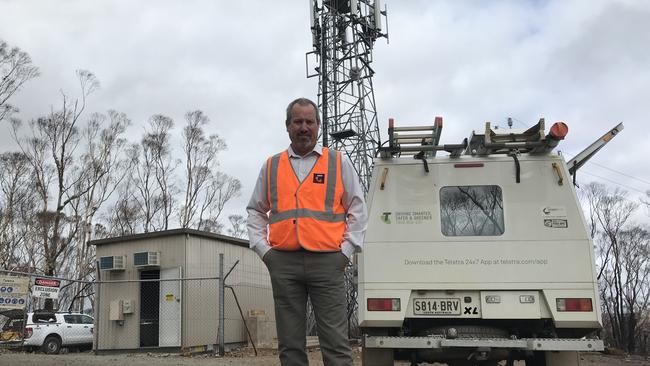 Mark Bolton, Regional General Manager for Telstra SA, inspects the restored mobile tower in Mount Torrens. Picture: Lydia Kellner.