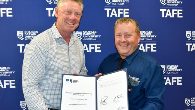 Motor Trade Association SA/NT CEO Darrell Jacobs and CDU TAFE Pro Vice Chancellor and Chief Executive Officer of CDU TAFE Michael Hamilton. Picture: Motor Trade Association / Supplied.