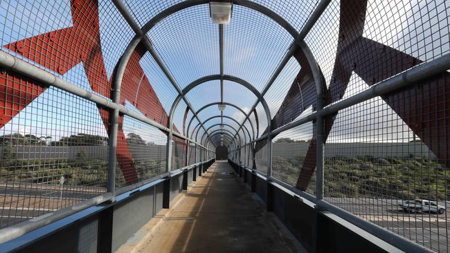 Some of the bridges, both pedestrian and vehicle, along the Southern Expressway are already covered. Picture: Dean Martin