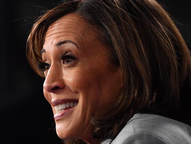 Democratic presidential hopeful California Senator Kamala Harris  speaks to the press in the Spin Room after participating in the fifth Democratic primary debate of the 2020 presidential campaign season co-hosted by MSNBC and The Washington Post at Tyler Perry Studios in Atlanta, Georgia on November 20, 2019. (Photo by Nicholas Kamm / AFP)