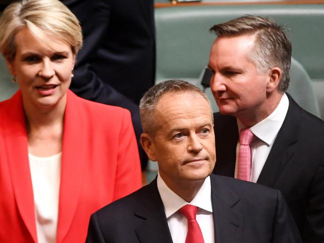 Opposition Leader Bill Shorten with Deputy Opposition Leader Tanya Plibersek and Chris Bowen looking on before he delivered Budget reply. Photo: Tracey Nearmy/Getty Images