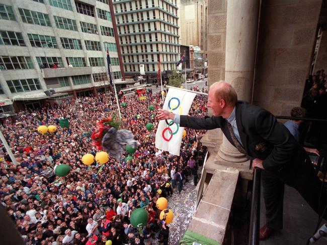 Thousands fill the city for a tickertape welcome-home parade for the Australian Olympic team in 1996.