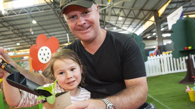 Lee Dyer and daughter Emma Dyer in the Little Backyard Farmers area at the Toowoomba Royal Show, Thursday, April 18, 2024. Picture: Kevin Farmer