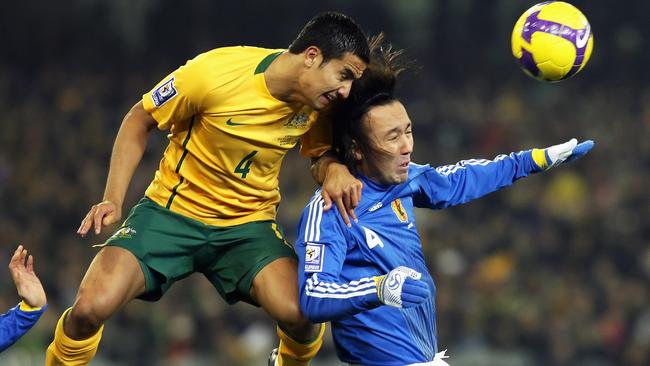 MELBOURNE, AUSTRALIA - JUNE 17: Tim Cahill of the Socceroos leaps over Marcus Tulio Tanaka of Japan to head the ball during the 2010 FIFA World Cup Asian qualifying match between the Australian Socceroos and Japan at the Melbourne Cricket Ground on June 17, 2009 in Melbourne, Australia. (Photo by Mark Dadswell/Getty Images)