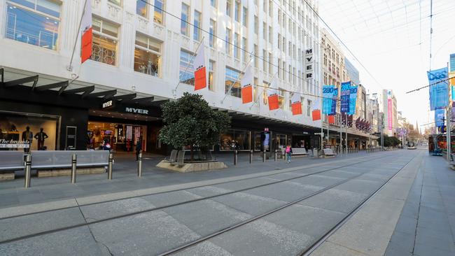 Bourke St Mall, pictured on Tuesday, has rarely been this empty. If we follow the lead of New Zealand and the UK, expect more scenes like this. Picture: Alex Coppel