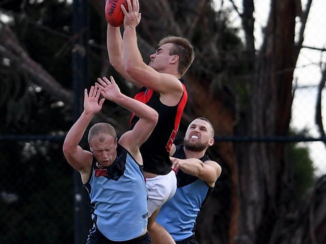 Pascoe Vale’s Matthew Watson takes a mark against Aberfeldie. Picture: Andy Brownbill