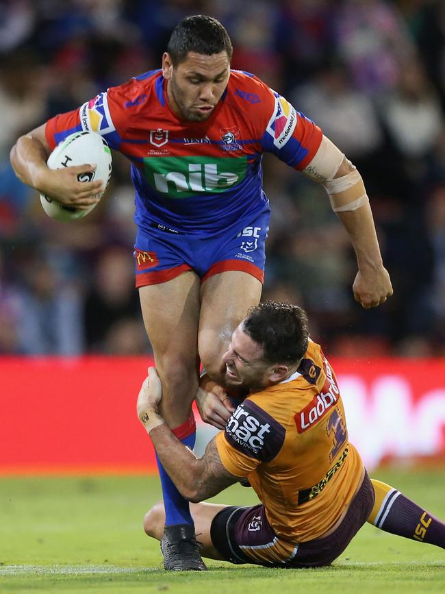 Jesse Ramien runs over Darius Boyd. Picture: Getty