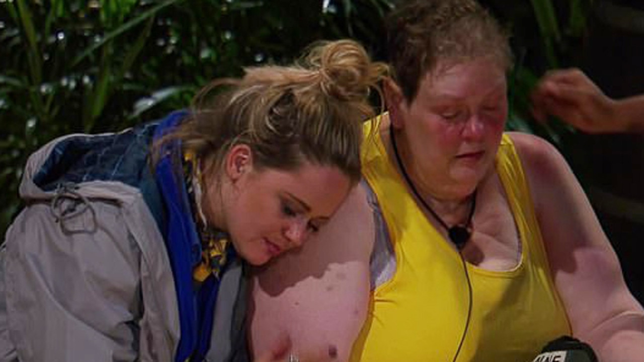 The Chase star Anne Hegerty being consoled by Emily Atack.