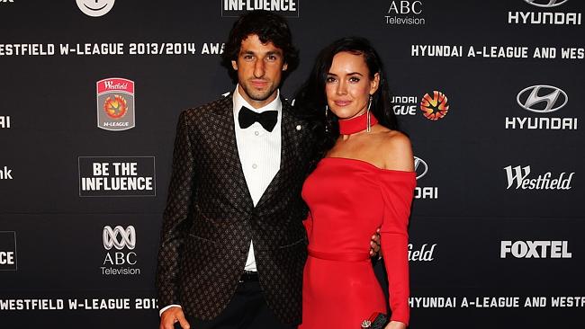 Thomas Broich of Brisbane Roar arrives on the red carpet with his partner Helena Blech.