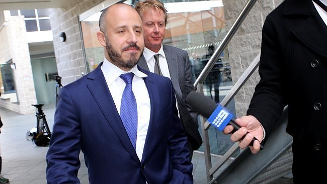 Former Auburn councillor Hicham Zraika leaves the inquiry. Picture: Stephen Cooper