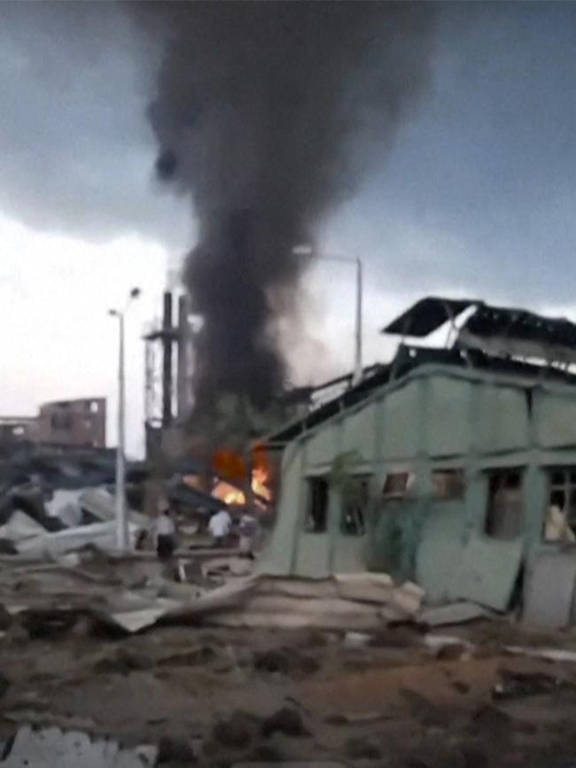 Smoke billowing above Yemen's rebel-held Hodeida port city following Israeli strikes. Picture: AFP/UGC