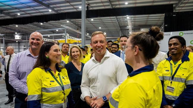 Former Queensland premier Steven Miles with Fortescue staff at the official opening of the company’s Gladstone electrolyser facility.