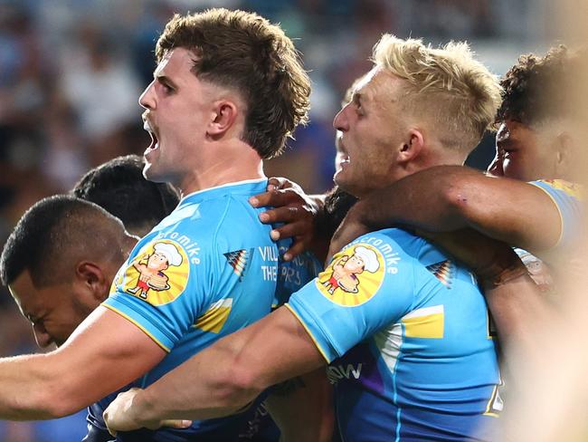 GOLD COAST, AUSTRALIA - APRIL 09: Toby Sexton  of the Titans celebrates a tryduring the round six NRL match between Gold Coast Titans and St George Illawarra Dragons at Cbus Super Stadium on April 09, 2023 in Gold Coast, Australia. (Photo by Chris Hyde/Getty Images)