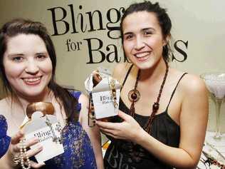 Laurelle Franklin and Madeleine Bushnell had a ball checking out the sparkly stuff at Bling for Babies fundraising night. . Picture: David Nielsen