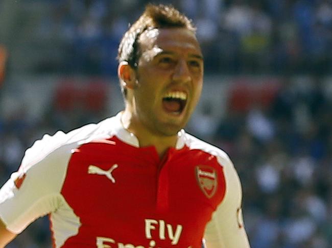 Arsenal's Alex Oxlade-Chamberlain, right, celebrates after he scores a goal during the English Community Shield soccer match between Arsenal and Chelsea at Wembley Stadium in London, Sunday, Aug. 2, 2015. (AP Photo/Kirsty Wigglesworth)