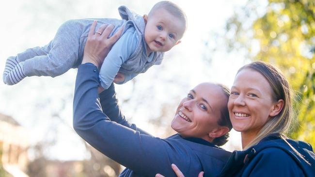 Kayla Mahoney and Erin Bezemer of Norwood with their son Ari. Picture: PATRICK GEE