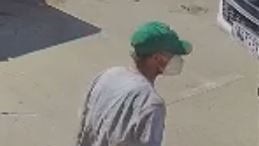 The first suspect had a green Las Vegas Oaklands Raiders cap on, with a grey shirt and a white mask. Image: supplied.