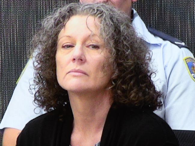 Kathleen Folbigg appears on a video link screened a the NSW Coroners Court, Sydney, Monday, April 2019, 2019. An Inquiry continues into convictions of "baby killer" Kathleen Megan Folbigg. (AAP Image/Peter Rae) NO ARCHIVING