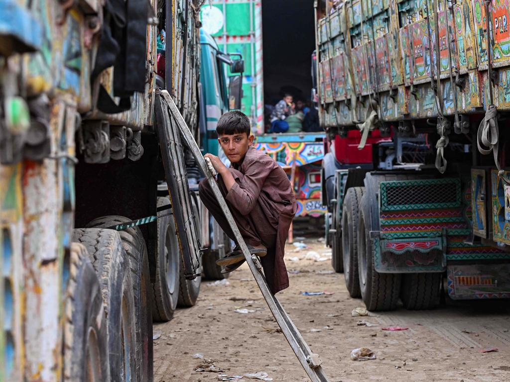 An Afghan refugee departs from a Pakistani holding centre in a mass exodus due to the government’s deportation deadline, which risks the lives of hundreds of thousands of Afghans. Picture: Farooq Naeem/AFP