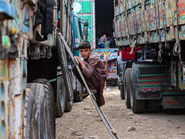 An Afghan refugee departs from a Pakistani holding centre in a mass exodus due to the government’s deportation deadline, which risks the lives of hundreds of thousands of Afghans. Picture: Farooq Naeem/AFP