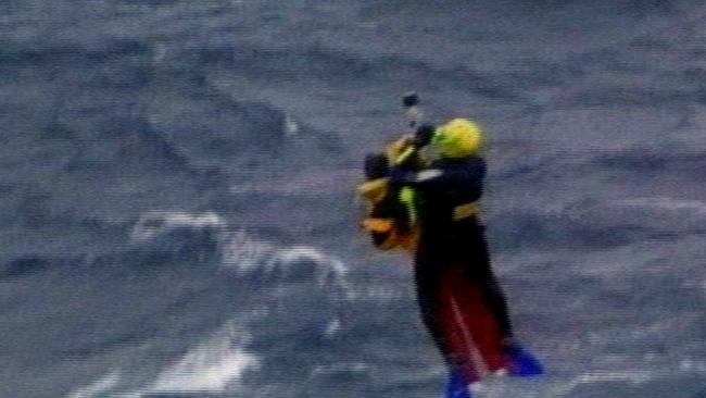 A rescue helicopter winching a sailor from the sea off NSW coast in the 1998 Sydney to Hobart.