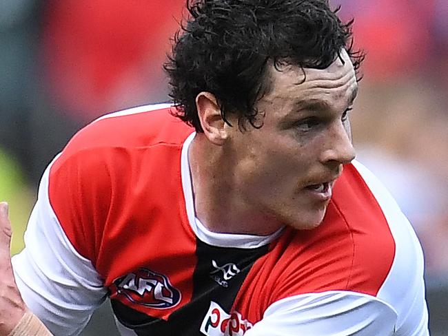 Jake Carlisle of the Saints is seen in action during the Round 15 AFL match between the Melbourne Demons and the St Kilda Saints at the MCG in Melbourne, Sunday, July 1, 2018. (AAP Image/Julian Smith) NO ARCHIVING, EDITORIAL USE ONLY