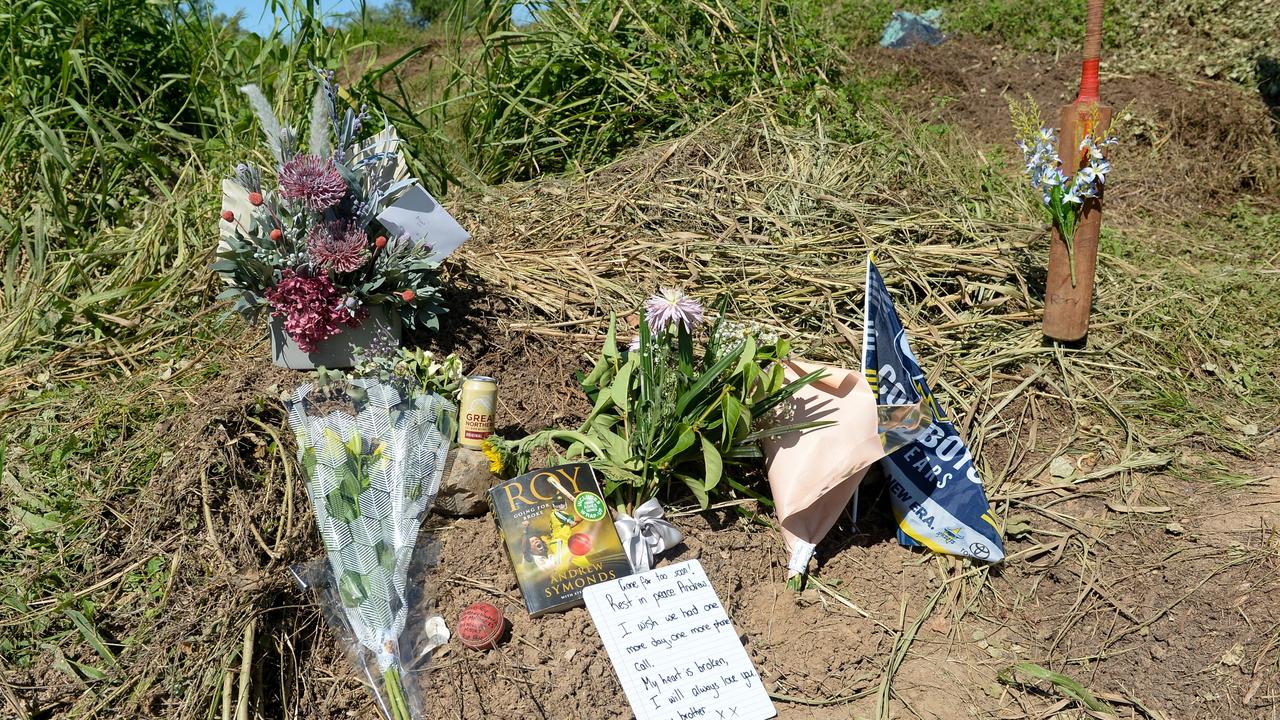 Site where Andrew Symonds was killed in a car accident. Locals have placed flowers, cards, cricket ball and bat in a memorial.