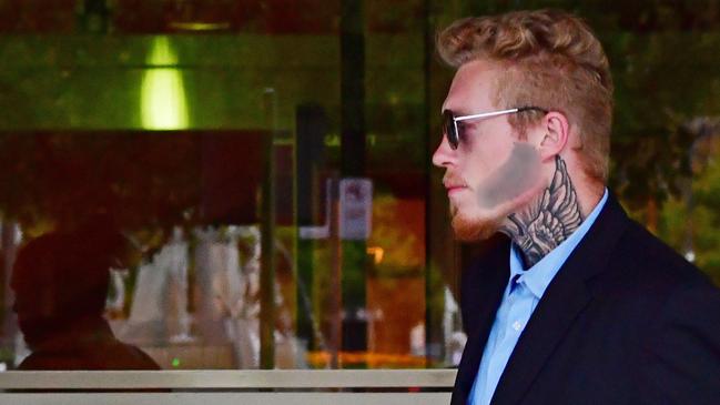 Starr Cahill and Brodie Tull leave the District Court where they are facing charges of criminal neglect. Picture: Brenton Edwards