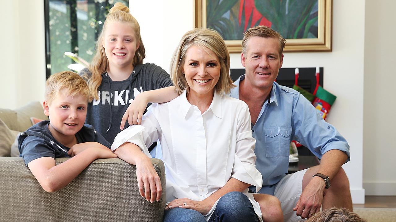 Georgie Gardner at home with her husband Tim Baker and kids Bronte and Angus Baker with their dog Wilbur.