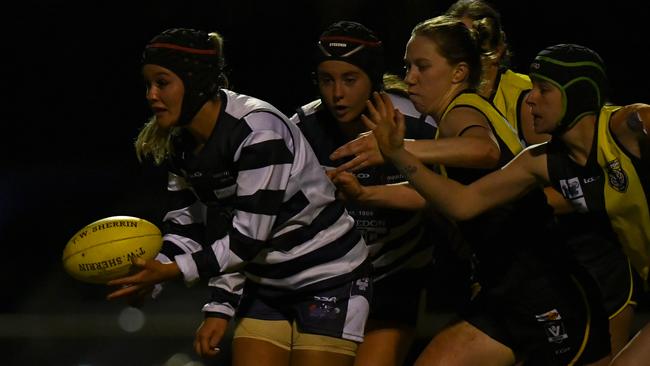 Scarlett Lynch of Macedon handballs during the 2023 Rookie Me RDFNL WomenÃs Grand Final match between Kyneton and Macedon at Gilbert Gordon Oval in Woodend, Victoria on August 5, 2023. (Photo by Josh Chadwick)