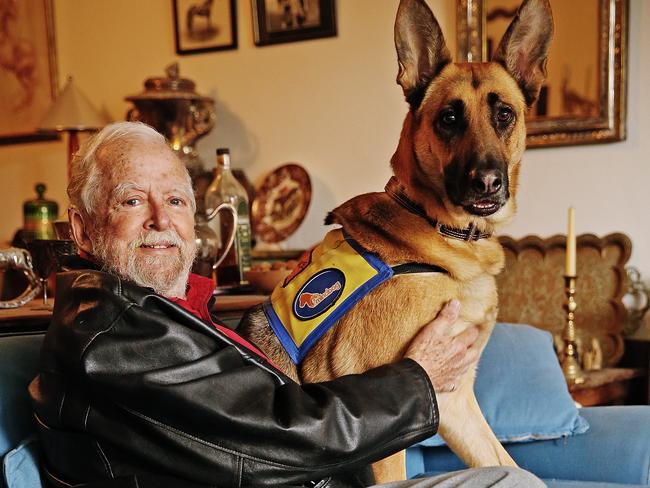 John Murphy says he “can’t go without” his pooch Rex. Picture: Sam Ruttyn