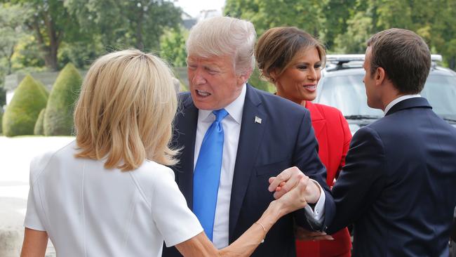 US President Donald Trump called French President Emmanuel Macron’s wife Bigitte beautiful. Cue outrage. (Pic: AFP/Michel Euler)