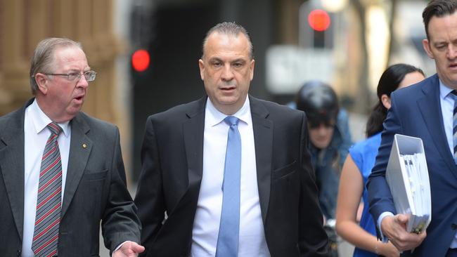 Peter V'landys (centre) arrives at the Federal Court in Sydney. Picture: NCA NewsWire/Steven Saphore