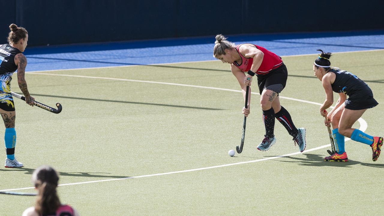 Rockhampton 1 captain Kim Reibel with the ball against Gold Coast 1.