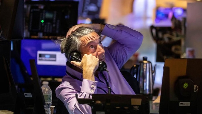 A trader works on the floor of the New York Stock Exchange. Picture Michael Nagle/Bloomberg