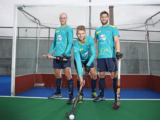 Josh Beltz, centre, with fellow Tasmanian Kookaburras’ teammates Jack Welch, left, and Eddie Ockenden, right. Picture: Luke Bowden