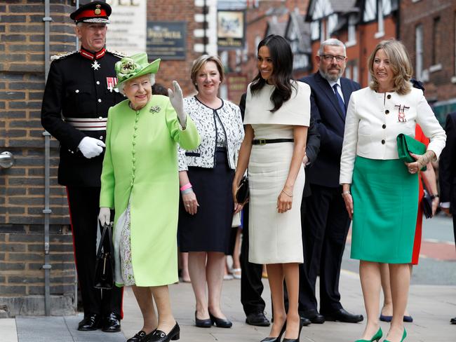 Queen Elizabeth II waves as Meghan, Duchess of Sussex and her arrive for their visit to the Storyhouse. Picture: Getty