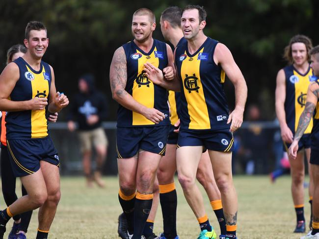 Travis Cloke and Cameron Cloke in action for Hurstbridge.