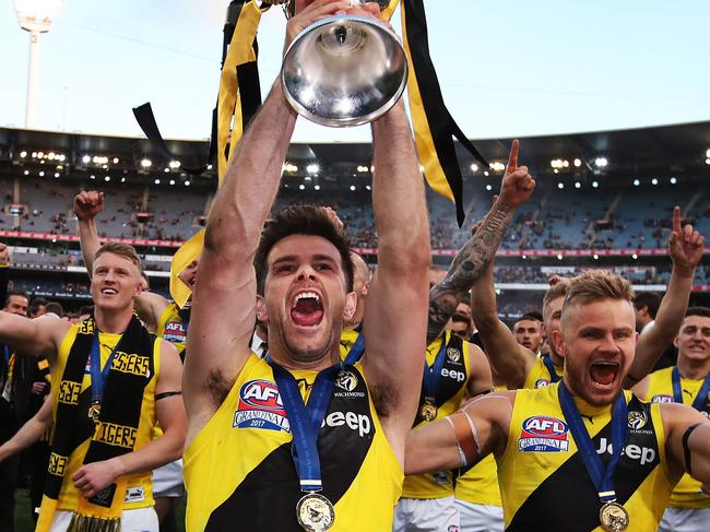 Tiger's captain Trent Cotchin celebrates with the Premiership Cup after Richmond defeated the Adelaide Crows in the 2017 AFL Grand Final at the MCG. picture. Phil Hillyard