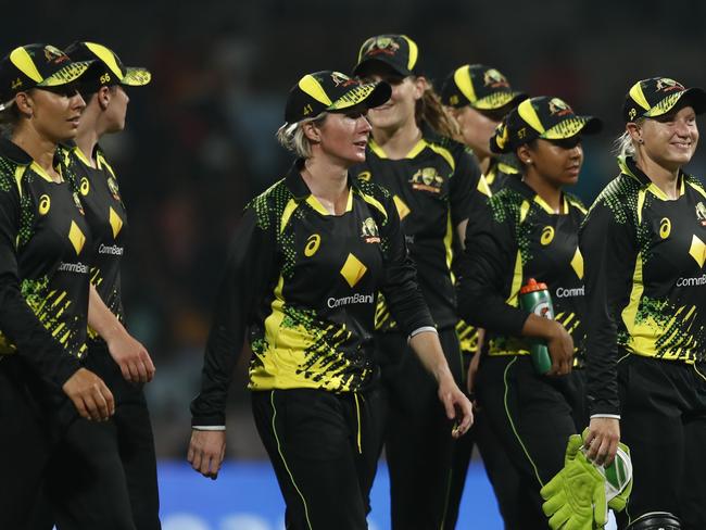 MUMBAI, INDIA - DECEMBER 11: Alyssa Healy (c) of Australia (R) with teammates during the T20 International series between India and Australia at Dr DY Patil Cricket Stadium on December 11, 2022 in Mumbai, India. (Photo by Pankaj Nangia/Getty Images)