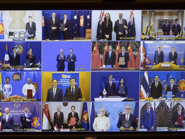 CANBERRA, AUSTRALIA - NCA NewsWire Photos November 15 2020: The Prime Minister Scott Morrison with Trade Minister Senator Simon Birmingham on the big screen, during a Regional Comprehensive Economic Partnership trade deal, in Parliament House Canberra, at Parliament House in Canberra.Australian farmers and businesses are set to benefit from better export opportunities with the signing of the Regional Comprehensive Economic Partnership (RCEP) Agreement between Australia and 14 other Indo-Pacific countries.Picture: NCA NewsWire /Gary Ramage